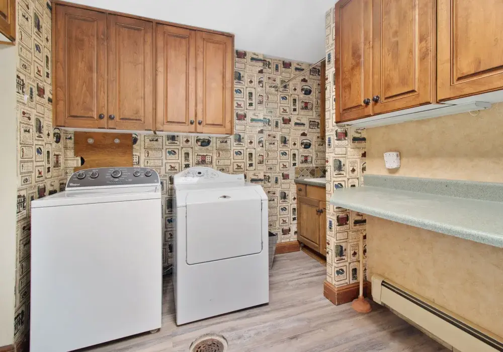 Bright home laundry room with folded towels on the counter