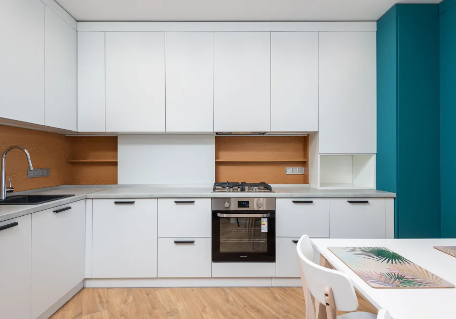 Professional stainless steel range built into a home kitchen