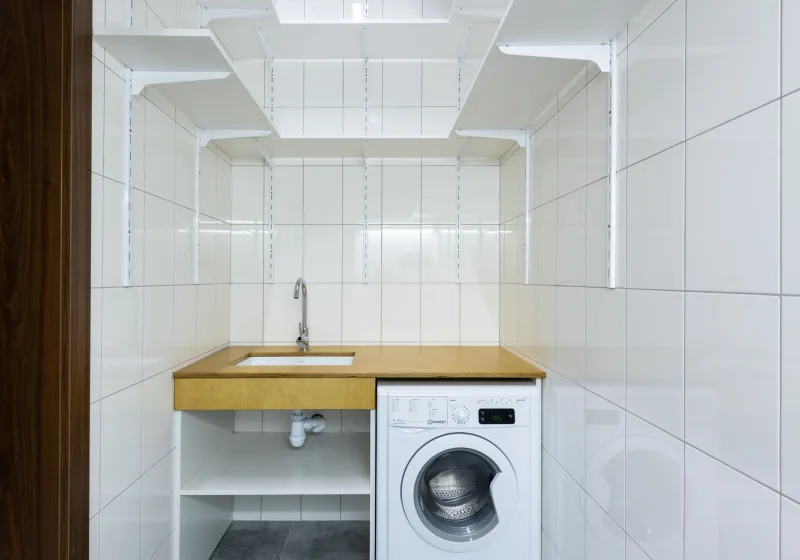 Washer and dryer in a bright home laundry room